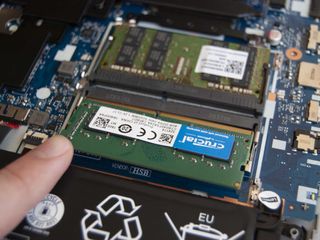 Slide the new RAM into the slot
