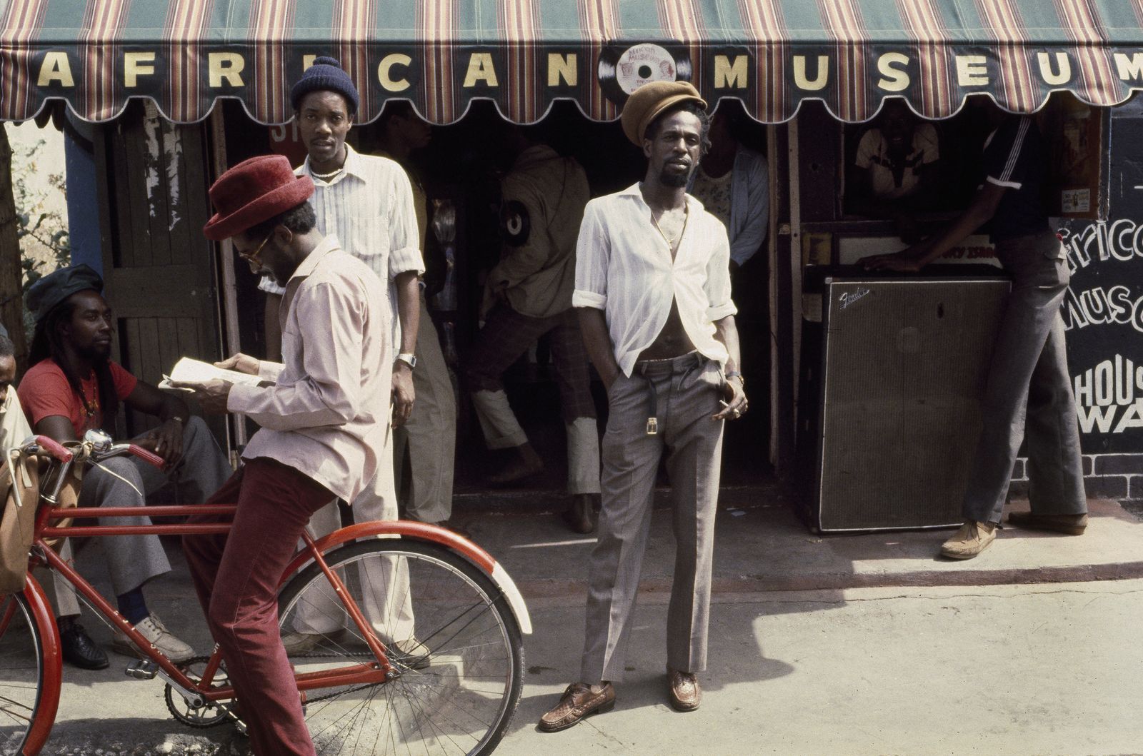 Singer Gregory Isaacs in front of his record shop, African Museum, on Chancery Lane, Kingston, Jamaica, 1984