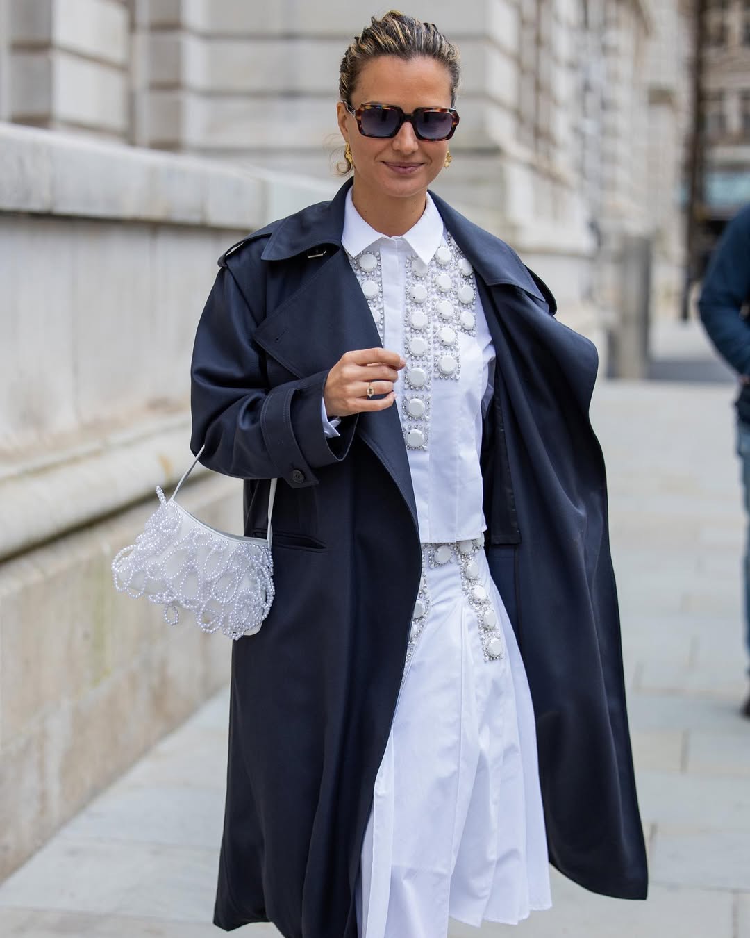 Mija Porter wearing an embellished white shirt