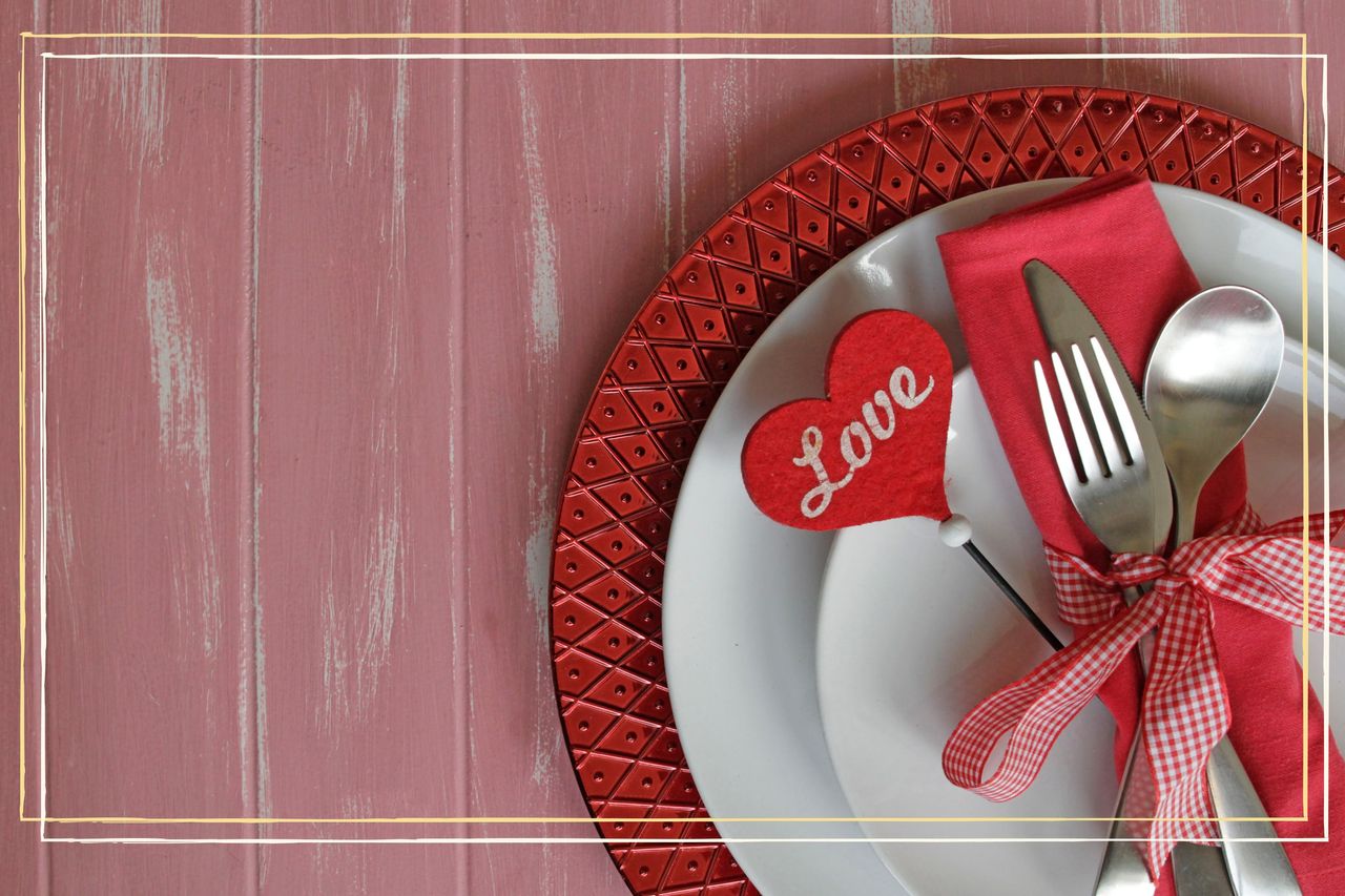 Valentine&#039;s Day table setting with plate and cutlery