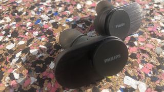 a closeup of the philips fidelio t1 earbuds
