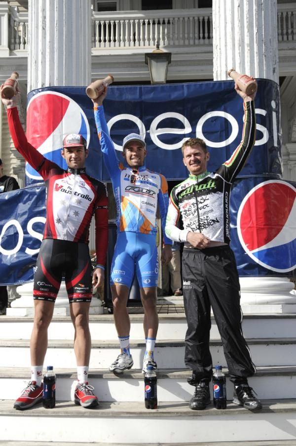 Podium: Jay Robert Thomson (Fly V Australia), Caleb Fairly (Holowesko Partners) and Floyd Landis (Bahati Foundation) with their bottles of chocolate milk from the local Battenkill Valley Creamery