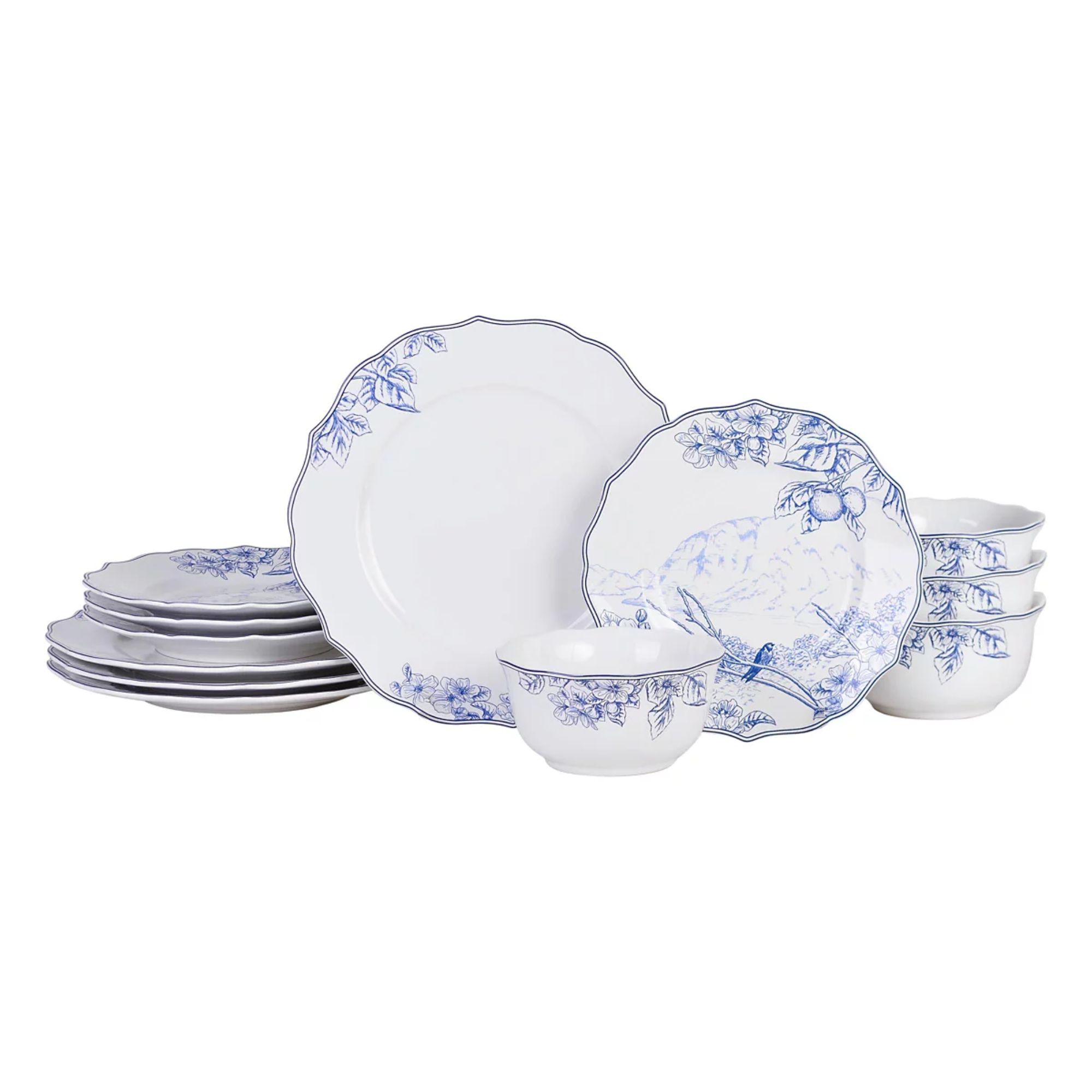 White dinner set with intricate blue floral designs and subtle scalloped edges