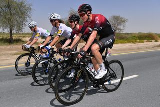 Chris Froome rides at the back of the peloton