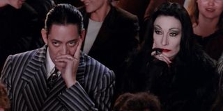 Raul Julia and Anjelica Huston in The Addams Family