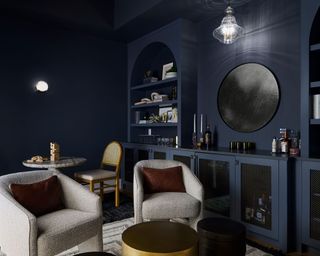 Modern home bar painted navy blue