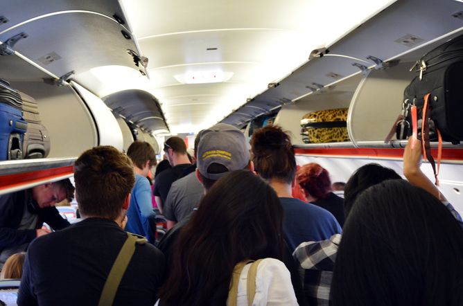 Passengers exiting airplane