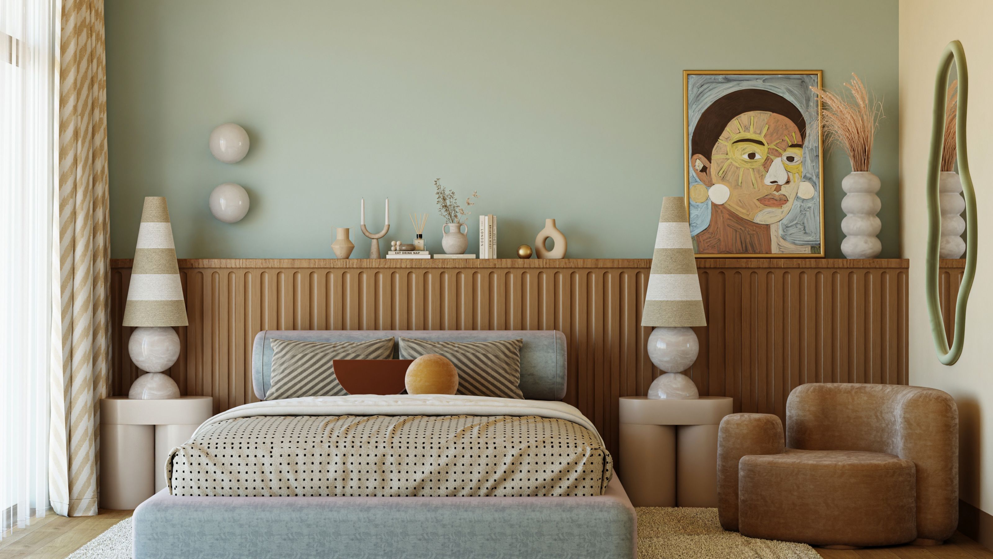 A bedroom with blue walls, beige ceiling, a large bed in the centre with two side tables, a sofa and a mirror 