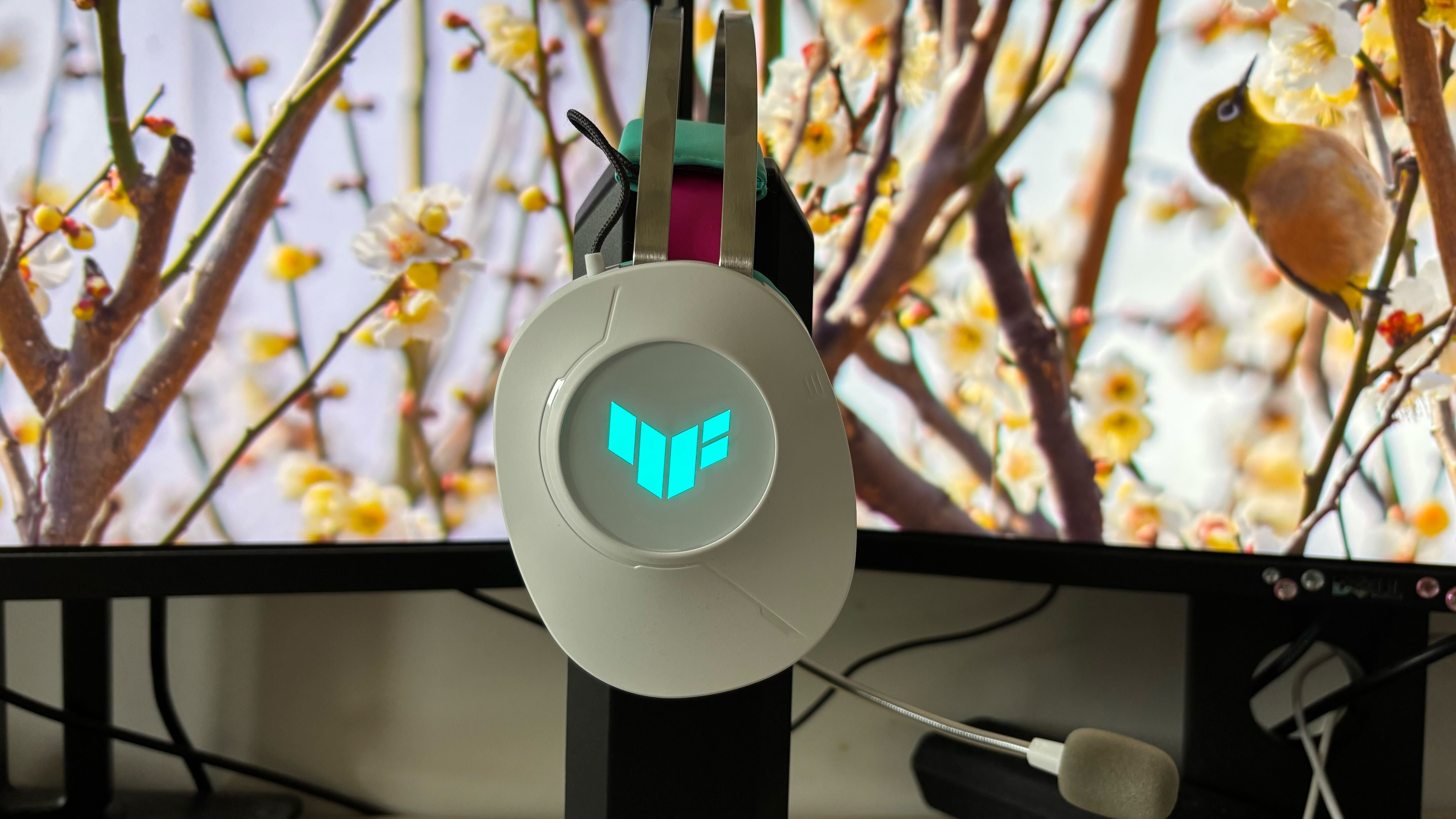 Miku x TUF Gaming Headset TUF logo lit up against floral background