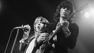 Mick Jagger (left) and Keith Richards perform with the Rolling Stones at the Empire Pool, Wembley, London on September 9, 1973