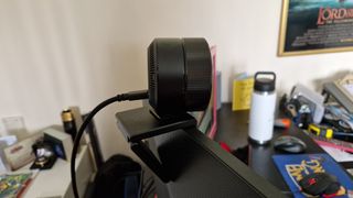 Razer Kiyo Pro Ultra on top of a monitor showing the simple braided USB-C cable