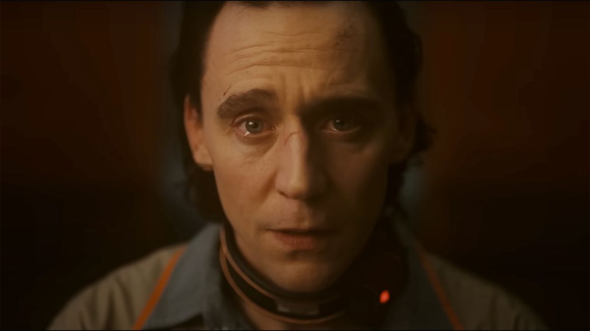 A close up of a teary-eyed Loki in his prison gear in Loki season 2