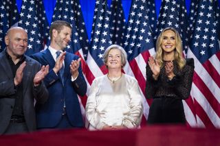 Dana White, Eric Trump, Susie Wiles and Lara Trump listen as Republican presidential nominee former President Donald Trump speaks after being declared the winner during an election night watch party.