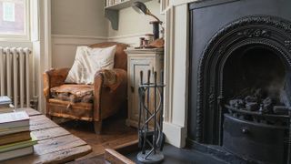 cast iron all-in-one fireplace in bedroom