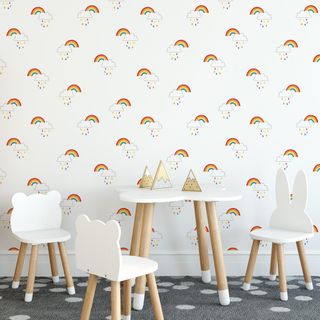 rainbow wallpaper with white table and chair