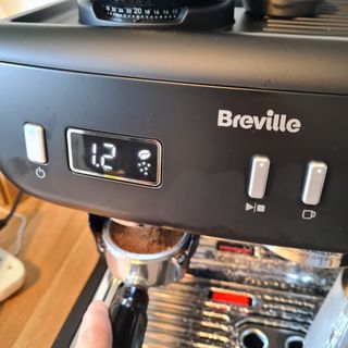 Breville Barista Max+ grinding beans