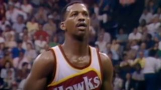 Eddie Johnson is at the free throw line while playing for the Atlanta Hawks