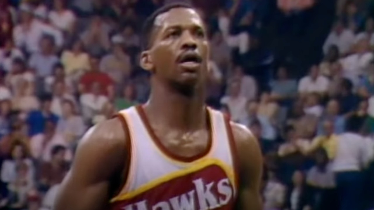 Eddie Johnson stands at the free throw line while playing for the Atlanta Hawks