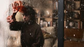 Sally Hawkins smearing blood on glass in Bring Her Back