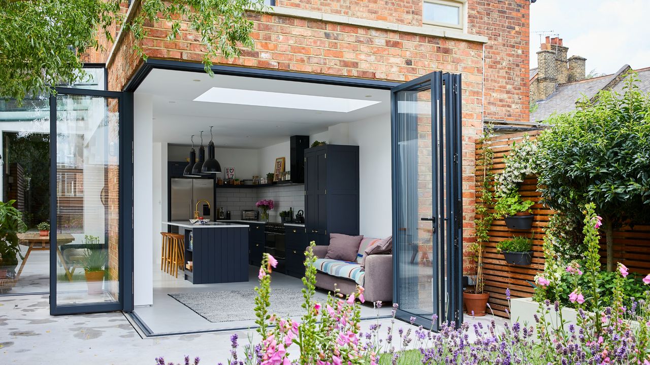 Single storey brick extension with corner bifold doors