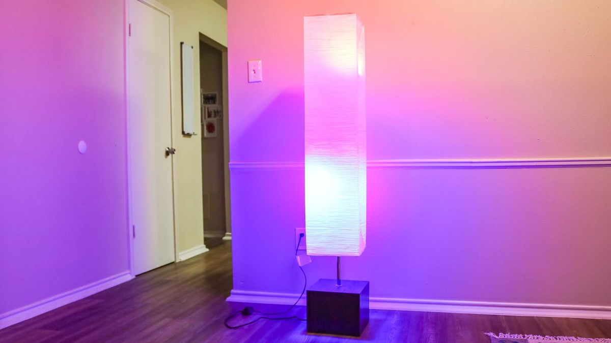 A lamp with two smart light bulbs inside