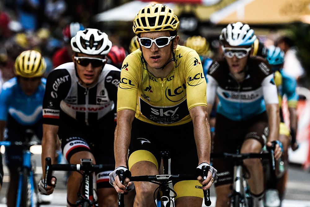 Yellow jersey Geraint Thomas (Team Sky) finishes in the main bunch