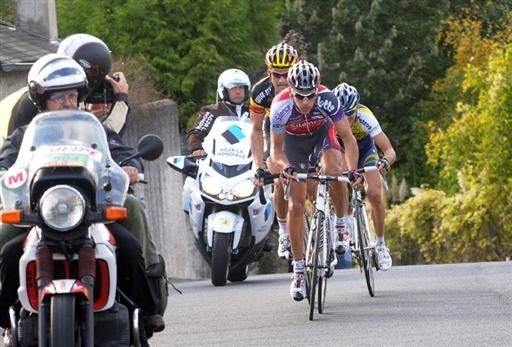 Gilbert pushes the pace to keep the trio clear.