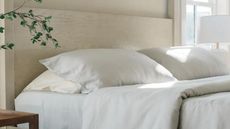 Hypoallergenic bed sheets from Cozy Earth on a bed.