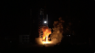 A Long March 2D rocket launches three of China's Yaogan 36 remote-sensing satellites to orbit on Oct. 14, 2022.