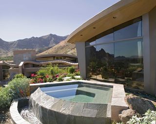 Exterior of modern house with curved plunge pool
