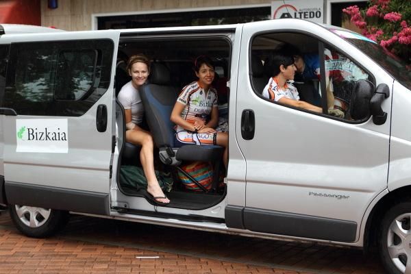 Riders stayed in team vans and buses to stay dry before the start