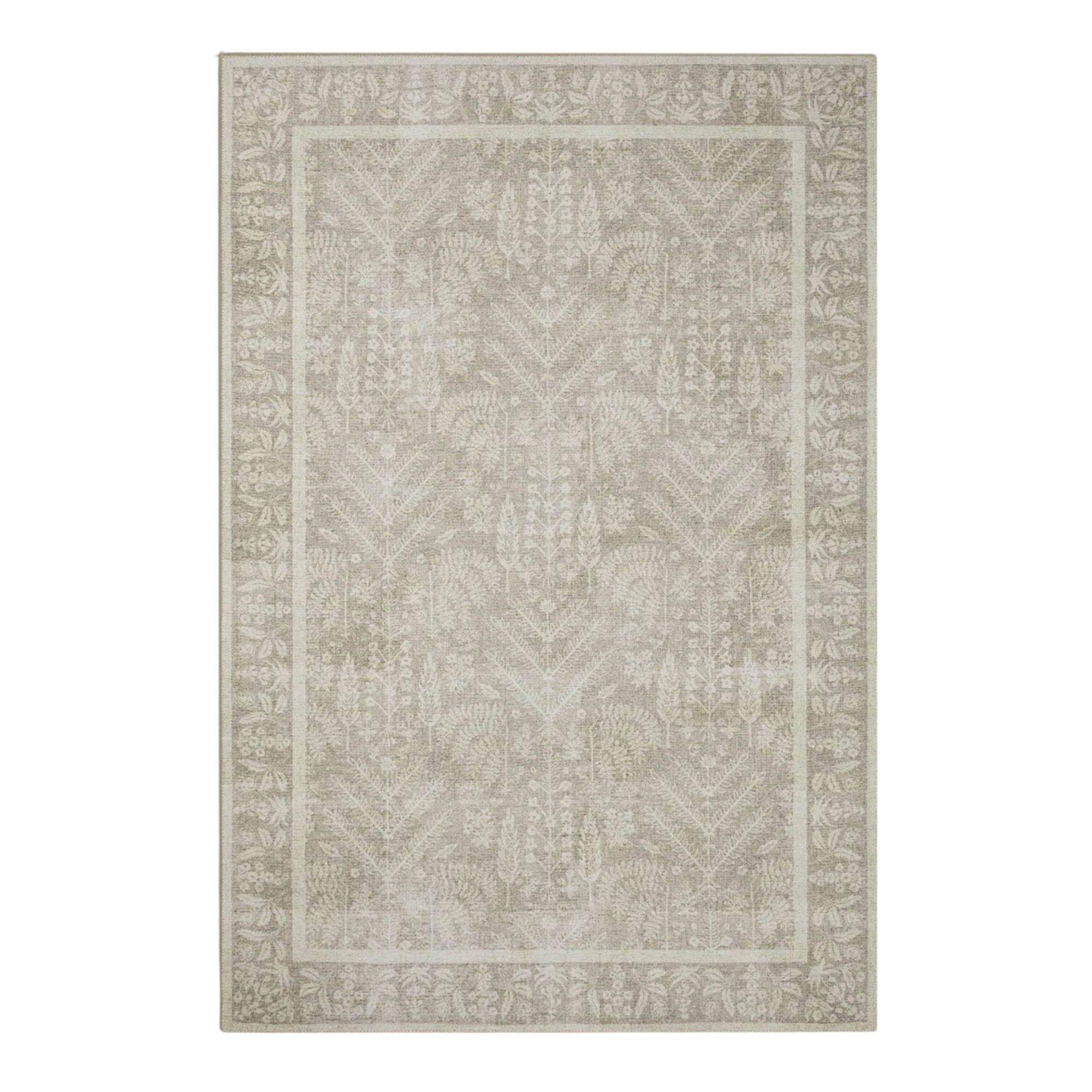 a soft green rug with whimsical detailing