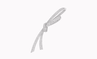 This 'Ruban' brooch or hairpiece - after all Chanel maintains its founder's modern approach to fine jewellery's wearability