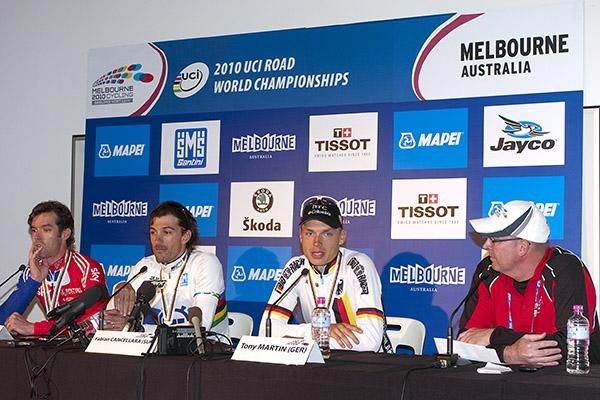 The medallists (l-r): David Millar (Great Britian), Fabian Cancellara (Switzerland), and Tony Martin (Germany) at the post-race press conference with event Media Director Dave Culbert.