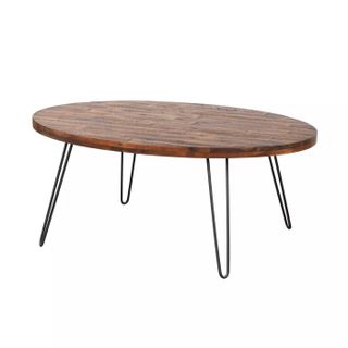 coffee table with oval shape and hair pin black legs