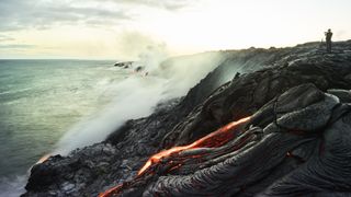 Hawaii, Big Island, Hawai'i Volcanoes National Park, lava flowing into pacific ocean