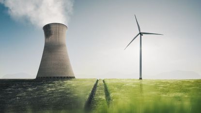 A power station and a wind turbine side by side in an agricultural field