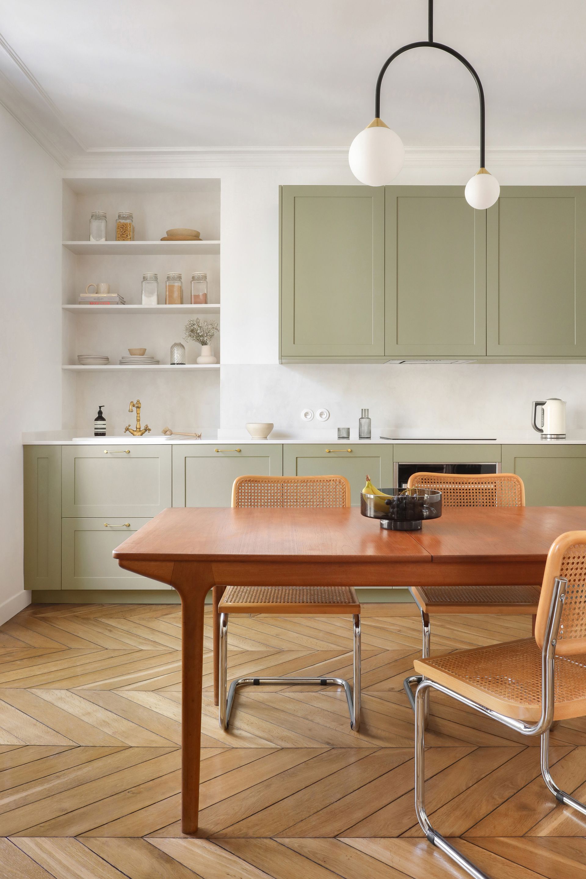 A pistachio-green painted kitchen