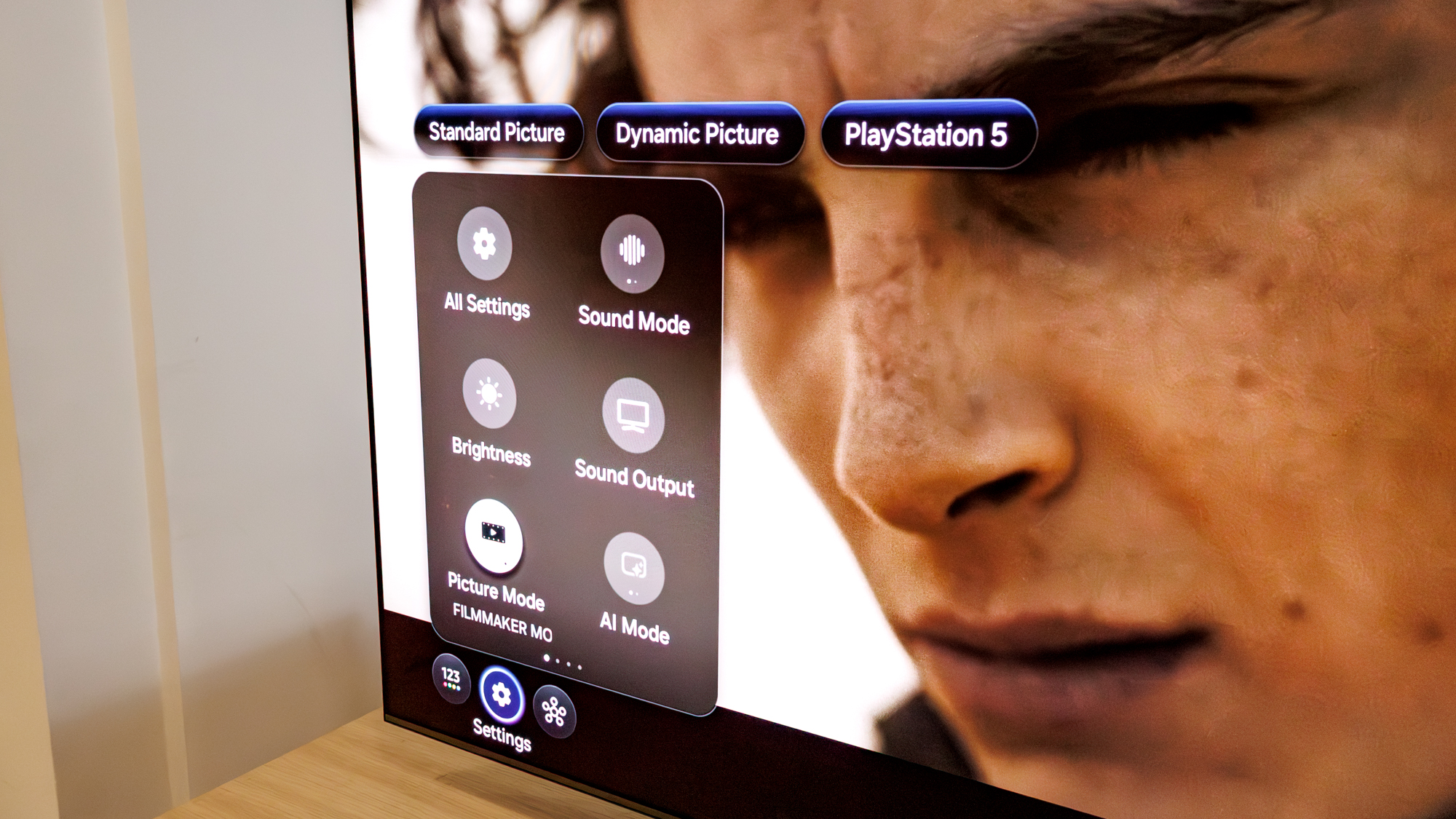 Samsung OLED S85F TV on a table