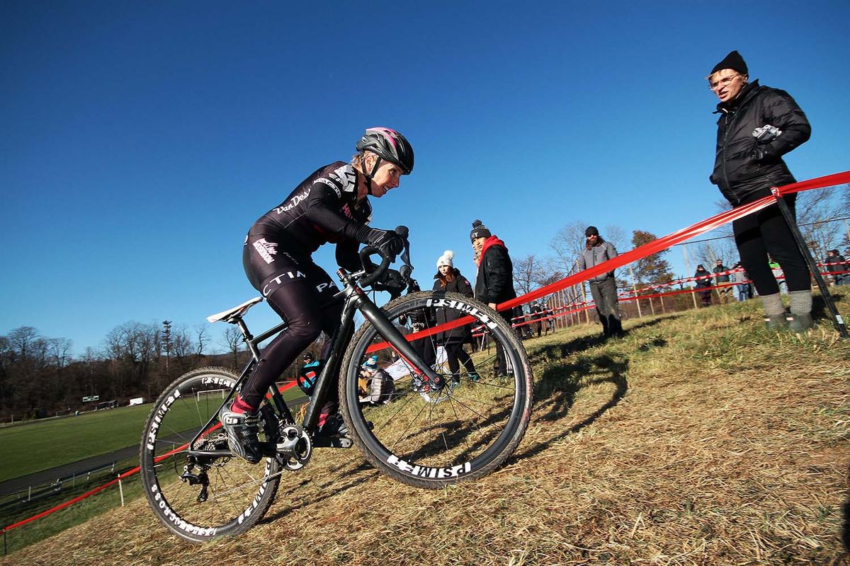 Laura Van Gilder (Mellow Mushroom) attacks the climb.