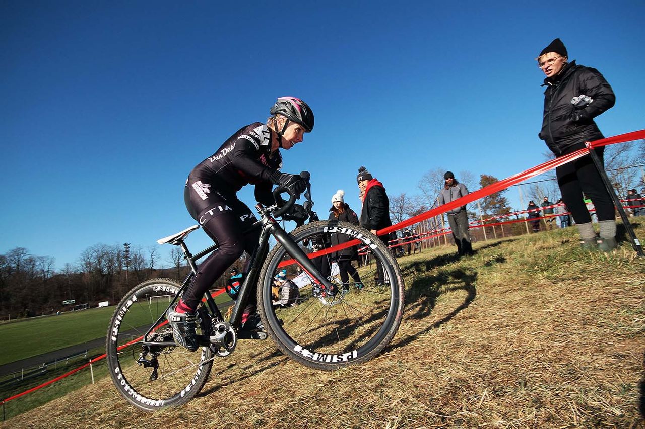 Laura Van Gilder (Mellow Mushroom) attacks the climb.