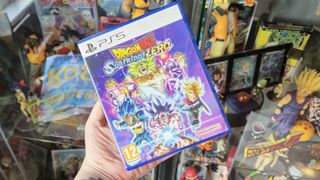 Image of author Rosalie Newcombe's hand holding Dragon Ball Sparking Zero on the PS5 in their hand.