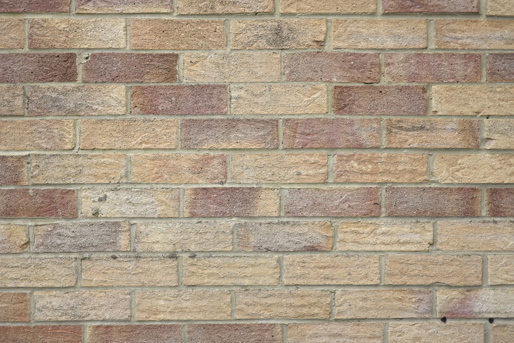 Image of a brick wall taken with the Nikkor Z DX 24mm f/1.7 lens to show vignetting correction
