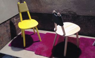 Colourful chairs by Emko on pink carpet pieces