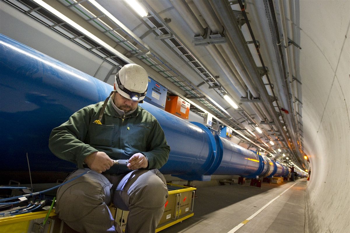 The LHC tunnel where particles accelerate.