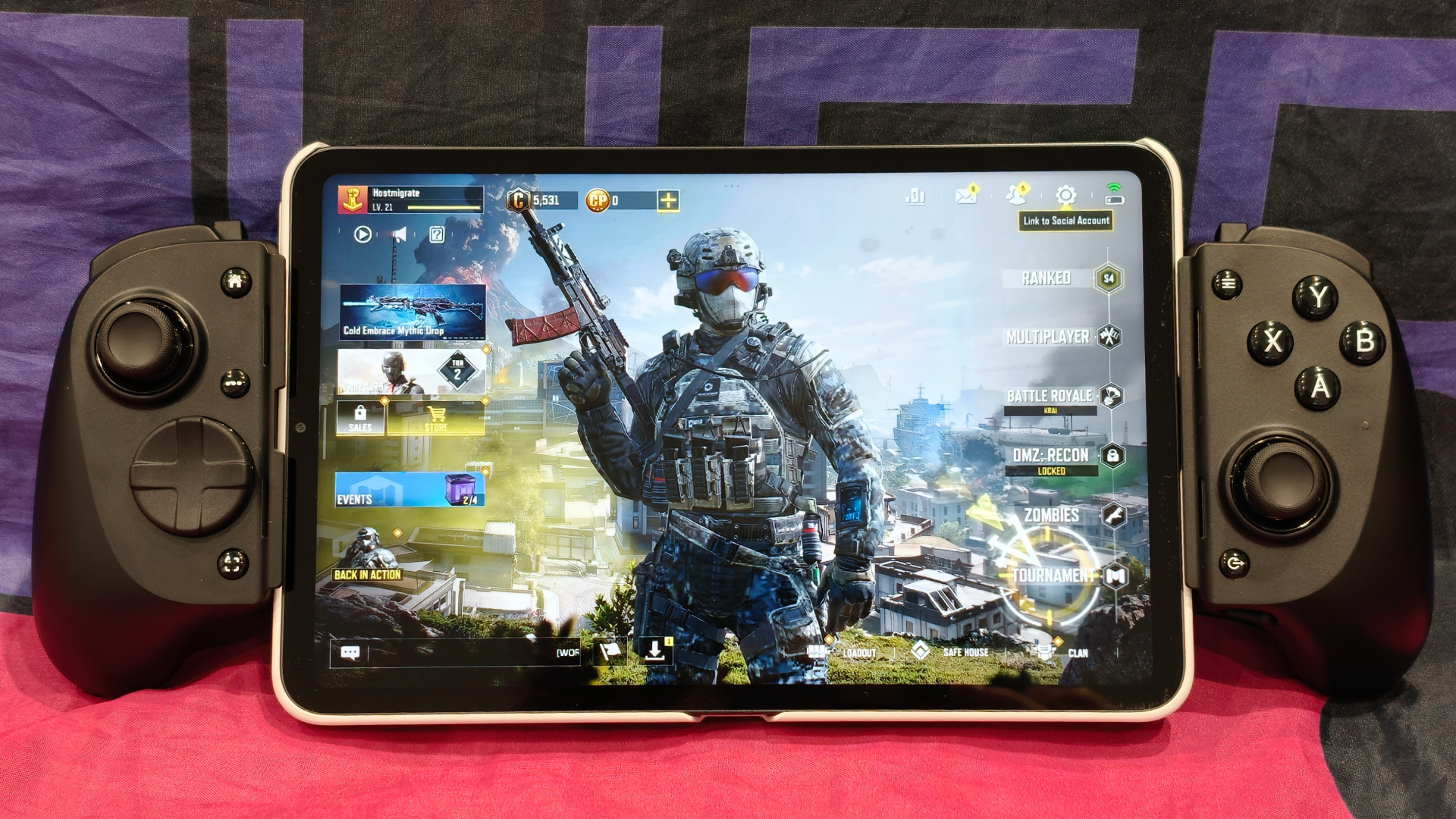 The Razer Kishi V3 Pro with a Xiaomi Pad Mini bracketed, open to the home screen of Call of Duty Mobile