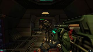 Pointing a huge gun at a robot in a hallway in System Shock 2 - a dead body is on the ground with blood underneath it