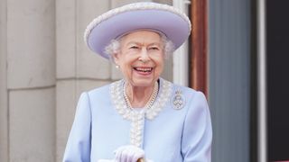 Queen Elizabeth II watches from the balcony of Buckingham Palace during the Trooping the Colour parade