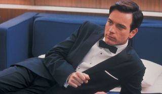 Down With Love Ewan McGregor lounging in a sharp tuxedo