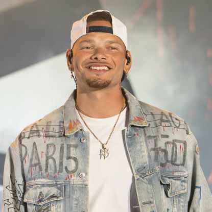 Kane Brown smiling on stage
